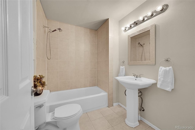 10571 Garfield St, Thornton, CO 80233 - full bathroom with tile patterned flooring, toilet, shower / tub combination, baseboards, and a sink