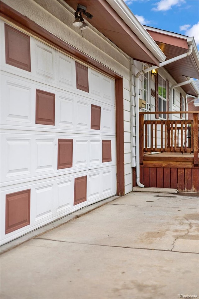 6327 Fenton St, Arvada, CO 80003 - garage with driveway and a ceiling fan