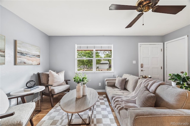 6327 Fenton St, Arvada, CO 80003 - living area with ceiling fan and baseboards