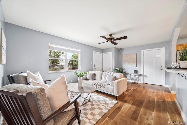 6327 Fenton St, Arvada, CO 80003 - living area featuring a ceiling fan and wood finished floors