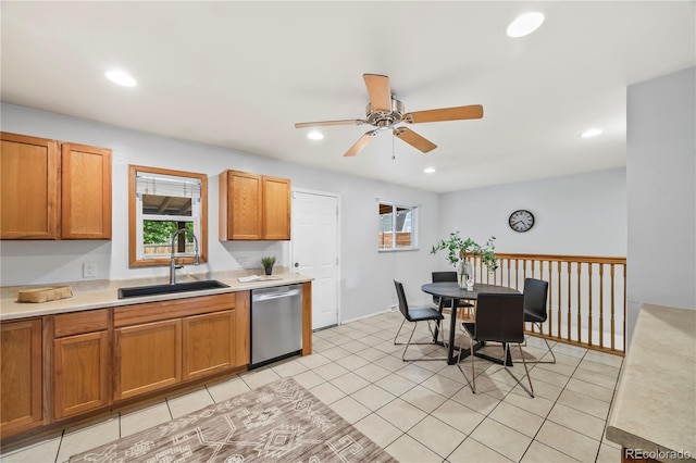 6327 Fenton St, Arvada, CO 80003 - kitchen with dishwasher, light countertops, a ceiling fan, recessed lighting, and brown cabinetry