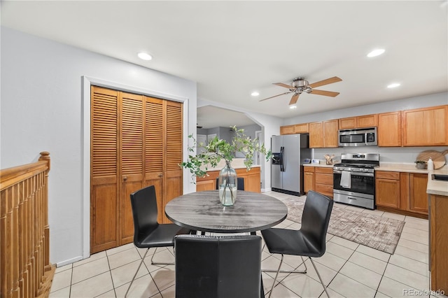6327 Fenton St, Arvada, CO 80003 - dining room featuring ceiling fan, recessed lighting, and light tile patterned floors