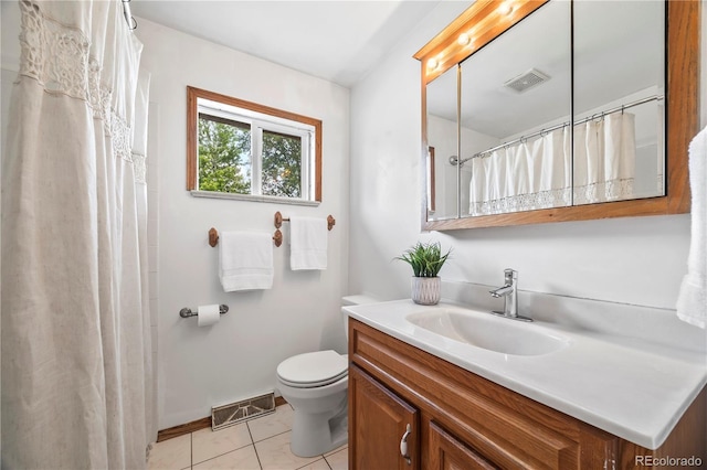 6327 Fenton St, Arvada, CO 80003 - bathroom featuring vanity and tile patterned flooring