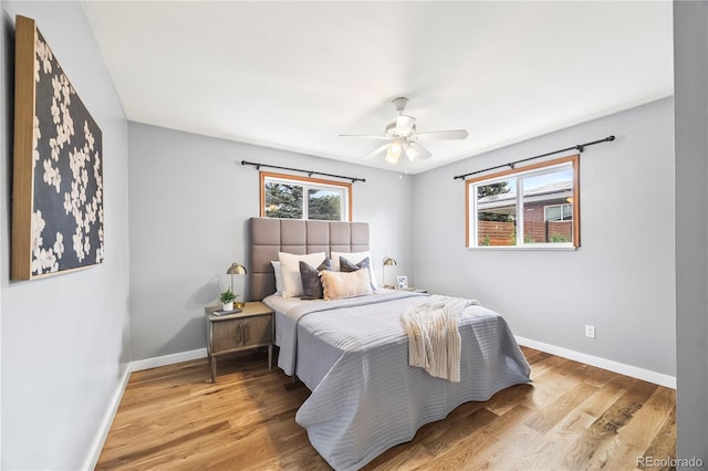 6327 Fenton St, Arvada, CO 80003 - bedroom featuring wood finished floors and ceiling fan
