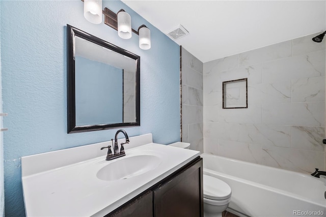 6327 Fenton St, Arvada, CO 80003 - bathroom with vanity, shower / washtub combination, and a textured wall