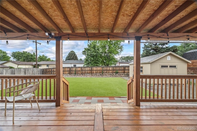 6327 Fenton St, Arvada, CO 80003 - wooden terrace with a fenced backyard and an outdoor structure