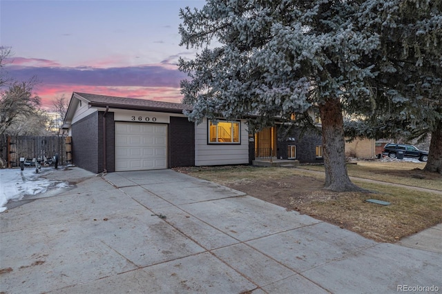 single story home featuring a garage