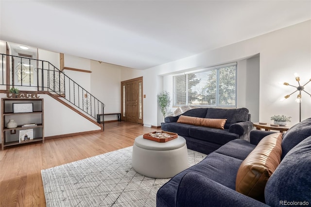 living room with light hardwood / wood-style flooring