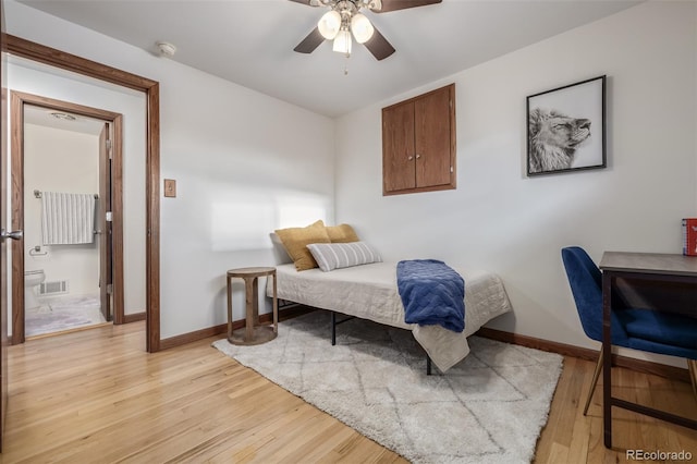 bedroom featuring ceiling fan and light hardwood / wood-style floors