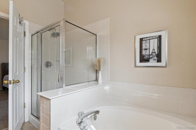 10517 Madison St, Thornton, CO 80233 - full bathroom with a stall shower and a garden tub