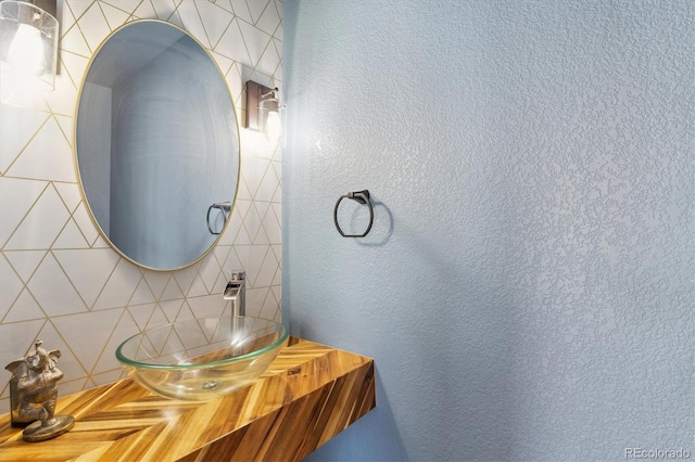 10517 Madison St, Thornton, CO 80233 - bathroom with tasteful backsplash and a sink