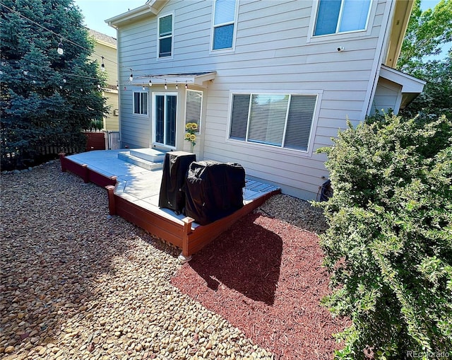 10517 Madison St, Thornton, CO 80233 - back of property featuring a wooden deck