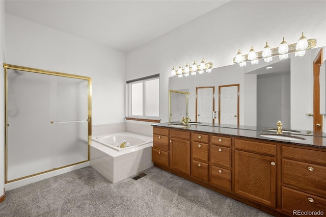 14447 Inca Ct, Westminster, CO 80023 - bathroom featuring a stall shower, a garden tub, carpet, and double vanity