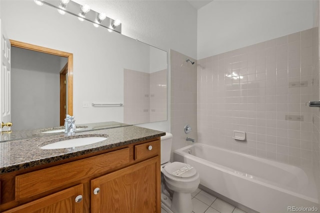 14447 Inca Ct, Westminster, CO 80023 - full bathroom featuring tile patterned floors, shower / washtub combination, toilet, and vanity