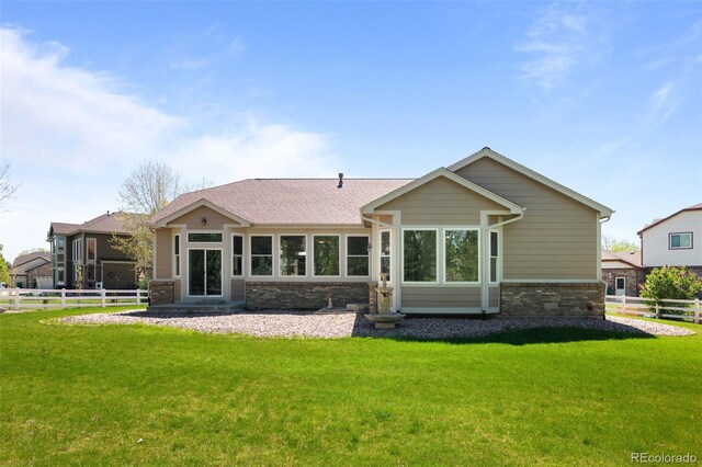 14447 Inca Ct, Westminster, CO 80023 - back of property featuring brick siding and a shingled roof