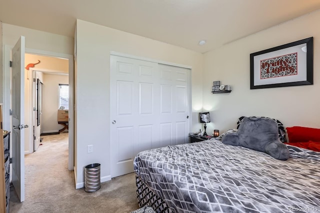 1199 Hummingbird Cir, Longmont, CO 80501 - bedroom with carpet floors and a closet