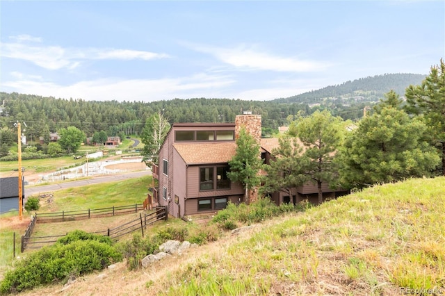 3260 Bit Rd, Evergreen, CO 80439 - mountain view with a forest