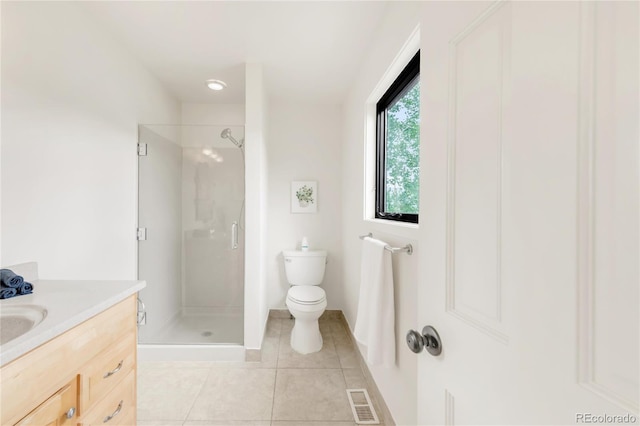 3260 Bit Rd, Evergreen, CO 80439 - full bathroom featuring a stall shower, tile patterned floors, and vanity