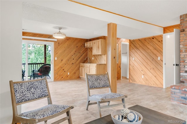 3260 Bit Rd, Evergreen, CO 80439 - living room featuring wooden walls and baseboards
