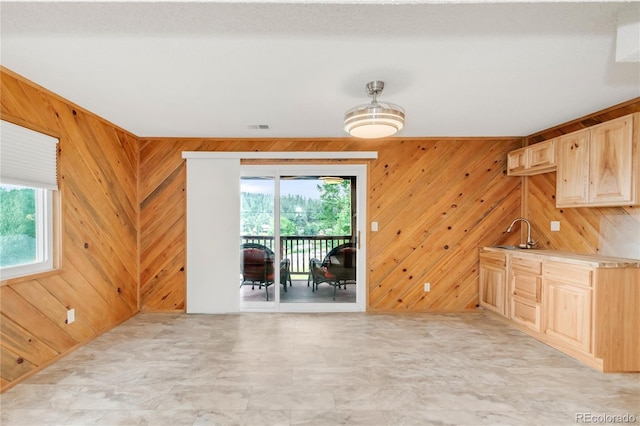 3260 Bit Rd, Evergreen, CO 80439 - unfurnished dining area with a sink and wooden walls