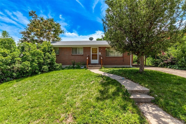 3182 W Radcliff Dr, Englewood, CO 80110 - view of front of house with brick siding and a front lawn