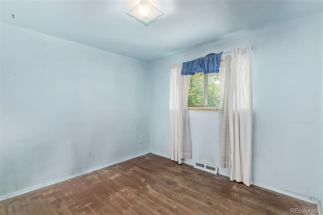3182 W Radcliff Dr, Englewood, CO 80110 - unfurnished room with wood finished floors and baseboards