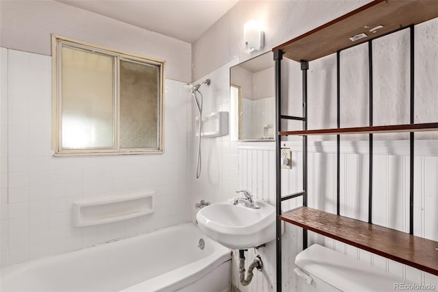 3182 W Radcliff Dr, Englewood, CO 80110 - bathroom with shower / tub combination, toilet, and a sink