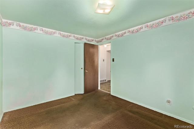 3182 W Radcliff Dr, Englewood, CO 80110 - carpeted empty room with baseboards