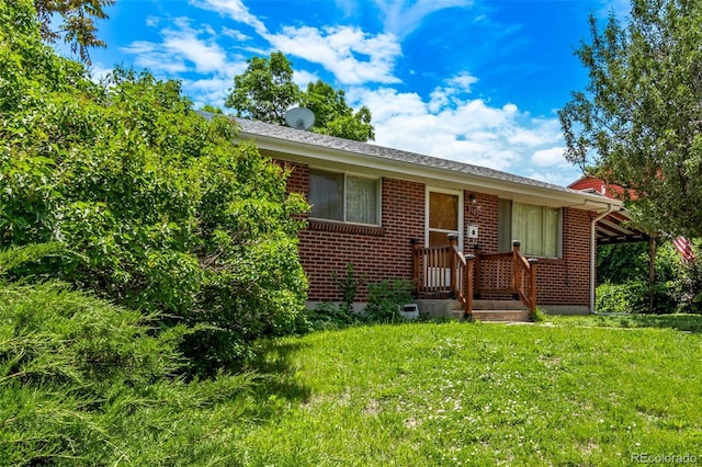 3182 W Radcliff Dr, Englewood, CO 80110 - bungalow-style home featuring brick siding and a front lawn