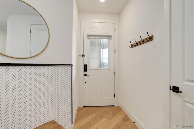 7029 Sagerock St, Castle Pines, CO 80108 - doorway to outside with light wood-style floors