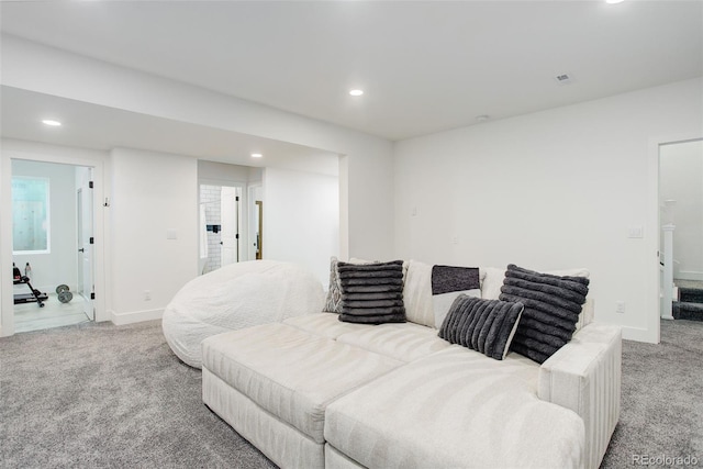 7029 Sagerock St, Castle Pines, CO 80108 - living room featuring light carpet, recessed lighting, and baseboards