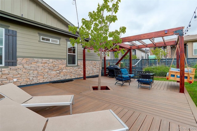 7029 Sagerock St, Castle Pines, CO 80108 - deck featuring a pergola and area for grilling