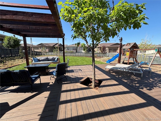7029 Sagerock St, Castle Pines, CO 80108 - deck featuring a fenced backyard, an outdoor living space, a playground, and a residential view