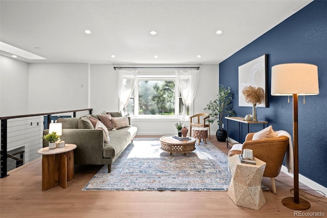 6742 Cole Cir, Arvada, CO 80004 - living room featuring wood finished floors and recessed lighting