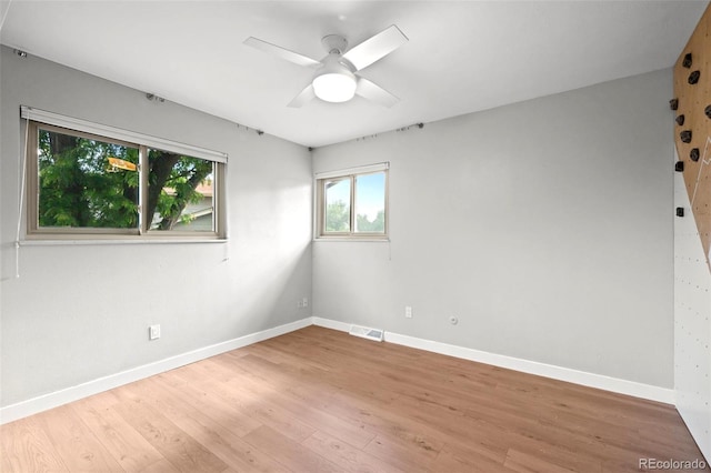 6742 Cole Cir, Arvada, CO 80004 - empty room with light wood-type flooring and ceiling fan