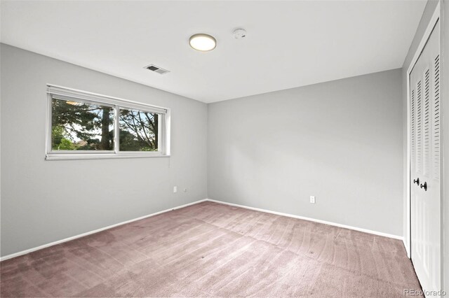 6742 Cole Cir, Arvada, CO 80004 - unfurnished bedroom featuring a closet and carpet flooring