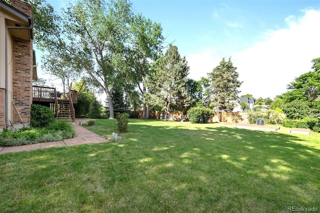 6742 Cole Cir, Arvada, CO 80004 - view of yard featuring stairway and a deck