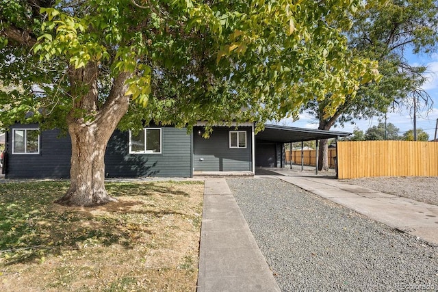 view of front of house featuring a carport