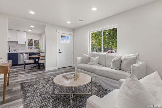 living room with hardwood / wood-style flooring