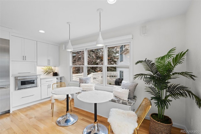 living room with light hardwood / wood-style floors