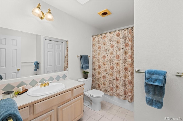 full bathroom with vanity, tile patterned floors, shower / bath combination with curtain, toilet, and tasteful backsplash