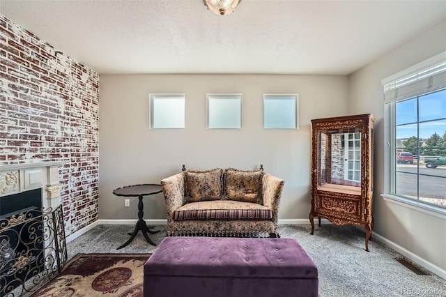 4206 Eagle Ridge Way, Castle Rock, CO 80104 - sitting room with carpet floors, a fireplace, baseboards, and a textured ceiling