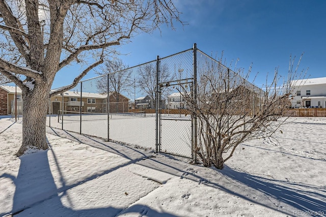 view of yard layered in snow