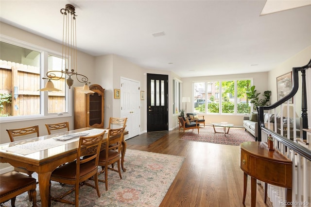 355 Steele St, Denver, CO 80206 - dining space with wood finished floors and baseboards