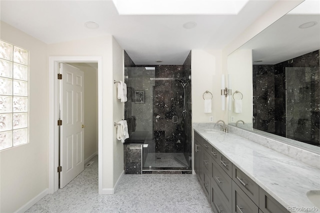355 Steele St, Denver, CO 80206 - full bathroom featuring a stall shower, double vanity, and baseboards