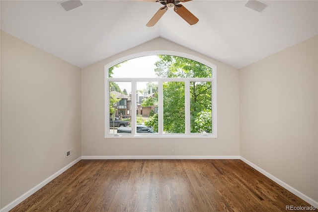 355 Steele St, Denver, CO 80206 - spare room featuring lofted ceiling, baseboards, ceiling fan, and wood finished floors