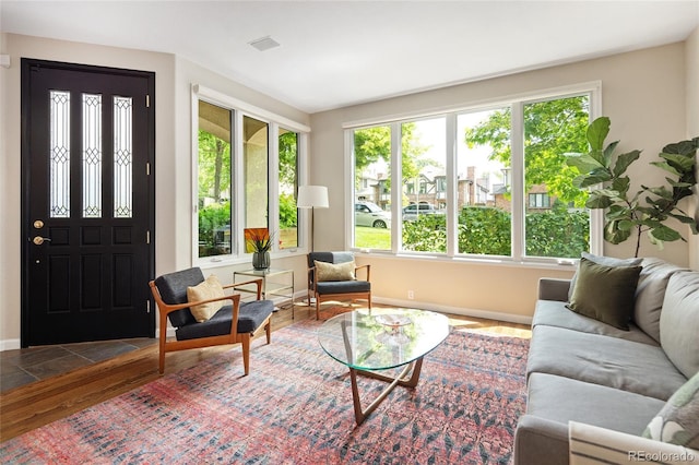 355 Steele St, Denver, CO 80206 - living room with wood finished floors and baseboards