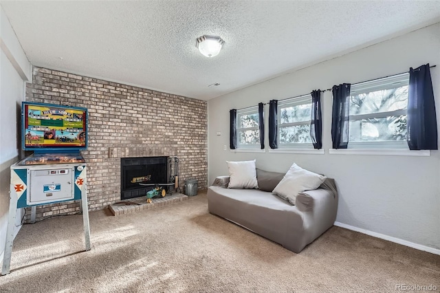 carpeted living room with a textured ceiling and a brick fireplace