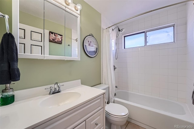 full bathroom with vanity, shower / bath combination with curtain, and toilet