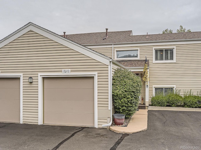 exterior space with a garage